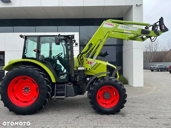 Claas Axos 330 z ładowaczem - 8