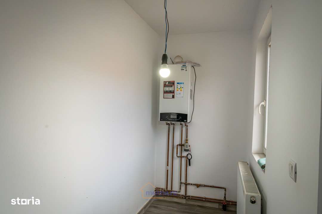 Casa de vanzare in spate la Kaufland Comanesti - Imagine principală: 5/13