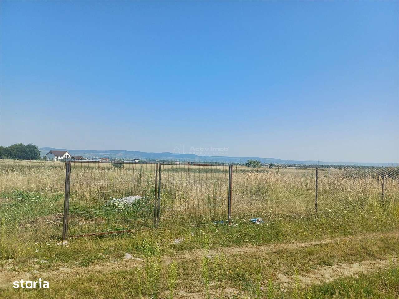 Teren intravilan de vanzare cu fantana si curent electric pe teren - Imagine principală: 5/6