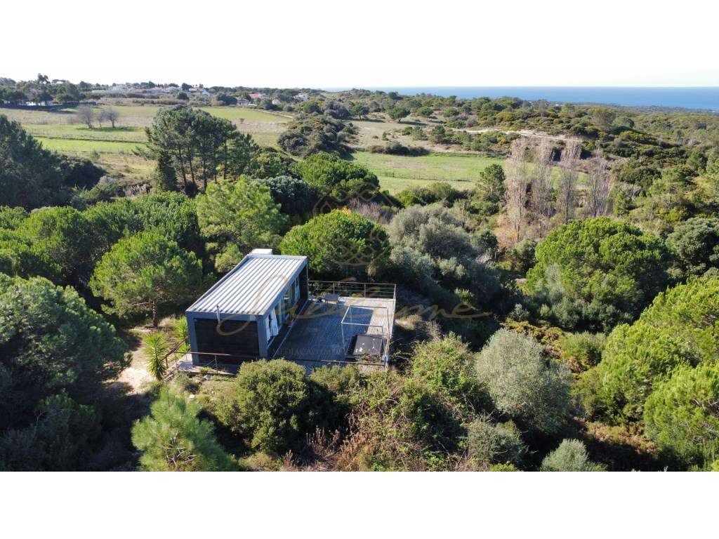 Lote de Terreno com casa Modular Vista de Mar - Grande imagem: 3/27