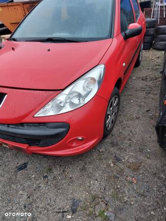 Lampa przednia lewa Peugeot 206+ - 1