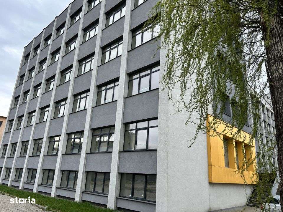 Cladire de vanzare D+P+4 cu 4670mp utili si curte 3650mp la 1280euro/m - Imagine principală: 4/16