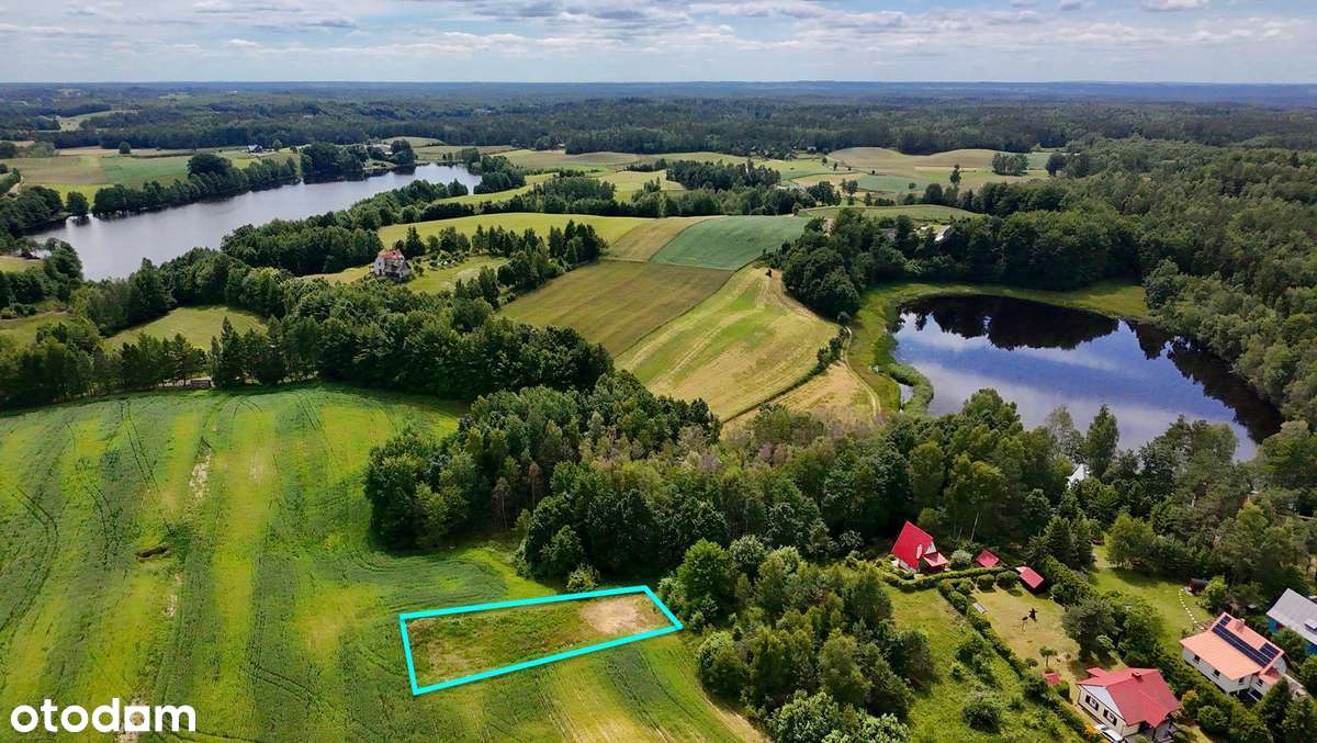 Bajeczna działka budowlana otoczona czterema jeziorami i gęstym lasem.-2