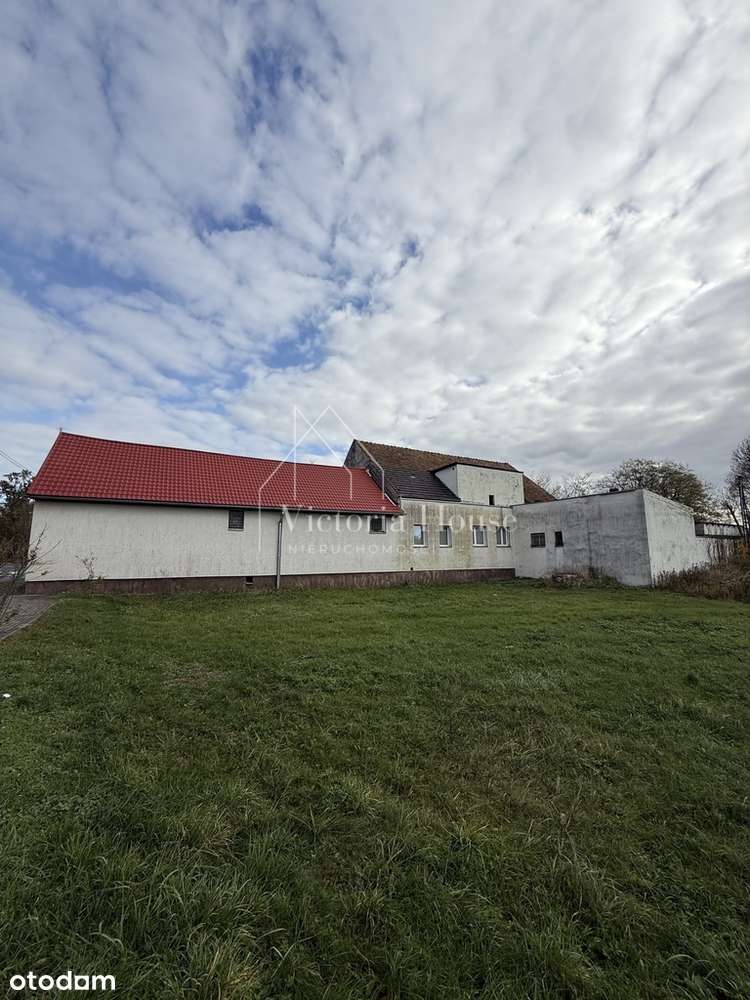 Teren usługowy z zabudowaniami.-0