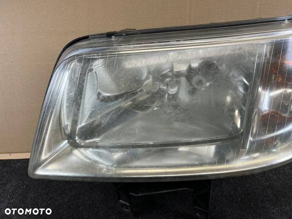 vw transporter t5 lampa lewa przód przednia OE europa 7H1941015N - 3