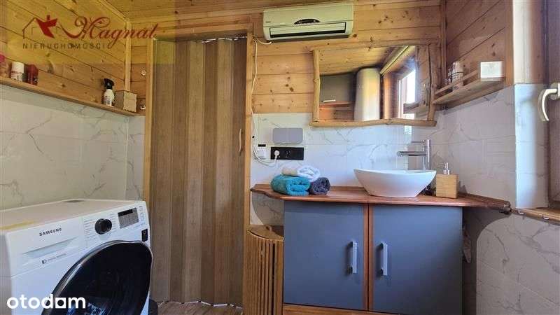 Atrakcyjny dom drewniany całoroczny na dużej dział-17