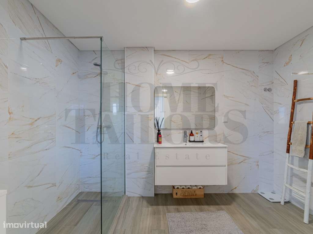 Moradia T3 em Caneças, com excelente jardim e garagem-11