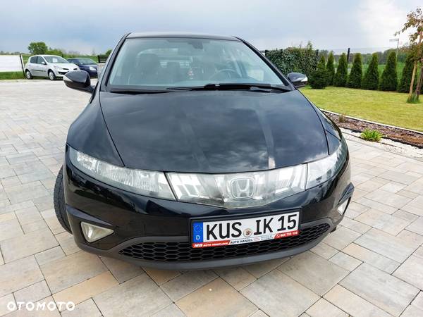 Honda Civic 1.8 Comfort - 31