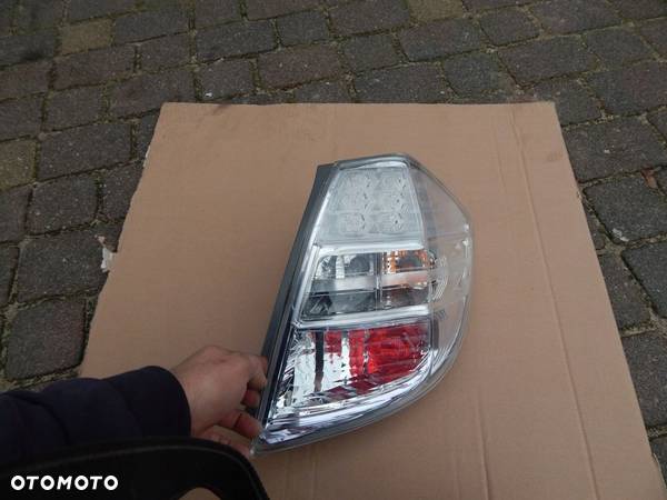 LAMPA PRAWA HONDA JAZZ HYBRID EUROPA - 1