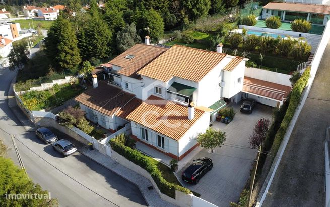 Moradia T5 nos Carvalhais com jardim, piscina e campo de jogos.-0