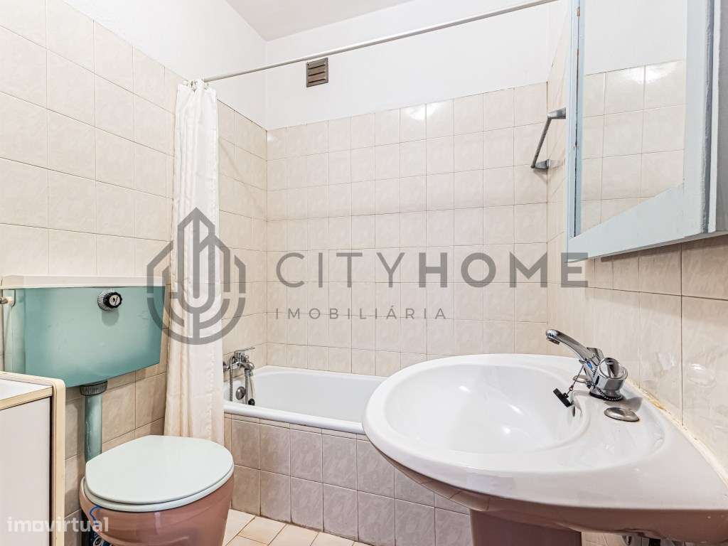 Moradia T2 +1 com garagem e espaço exterior-11