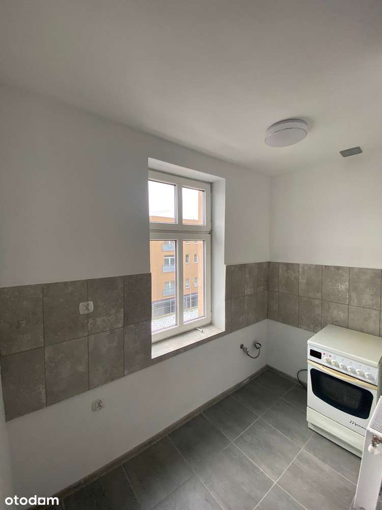 Wynajęta kamienica - 15 mieszkań, po remoncie-13