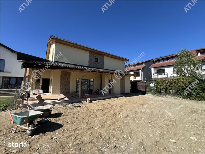 Casa la cheie cu 4 camere 3 bai si teren de 290 mp zona Brana Selimbar-1