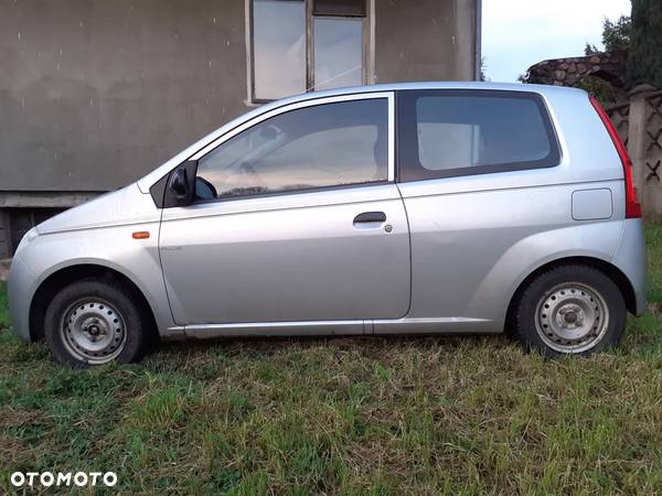 Daihatsu Cuore 1.0 Plus - 1