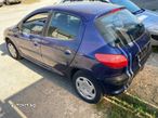 Dezmembrez Peugeot 206 1.4 b clima - 2