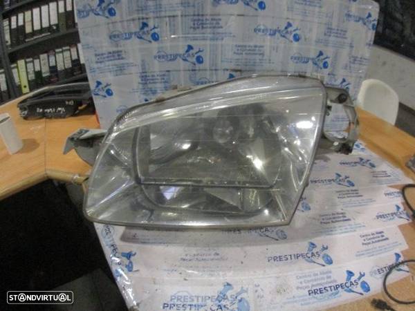 Farol 1305235392 MAZDA 323 1998 1.3I 75CV 5P VERDE ESQ H4 BOSCH - 1