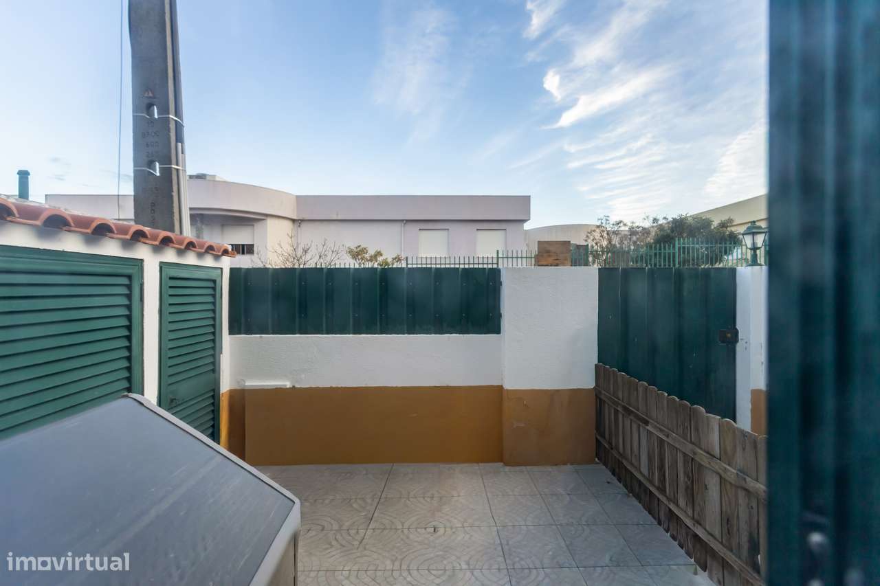 Moradia em banda T3 + 1-29