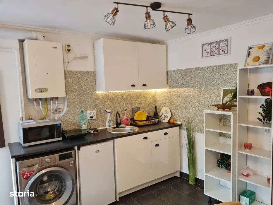 Investitie! Garsoniera finisata, terasa 14 mp, boxa, zona Turnul Pompi - Imagine principală: 4/10