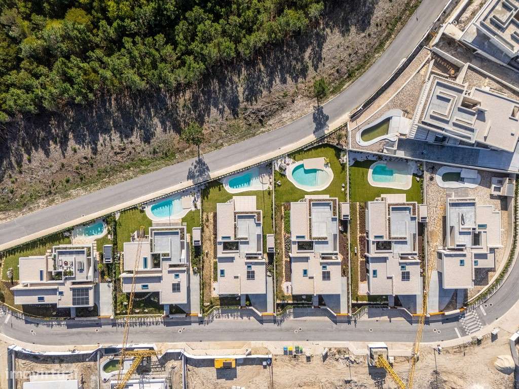 Moradia de extraordinária qualidade junto à lagoa, golfe e praia-48