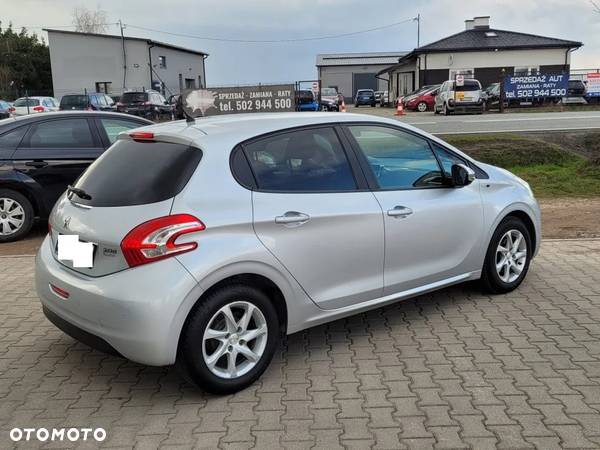 Peugeot 208 1.2 PureTech Style - 13