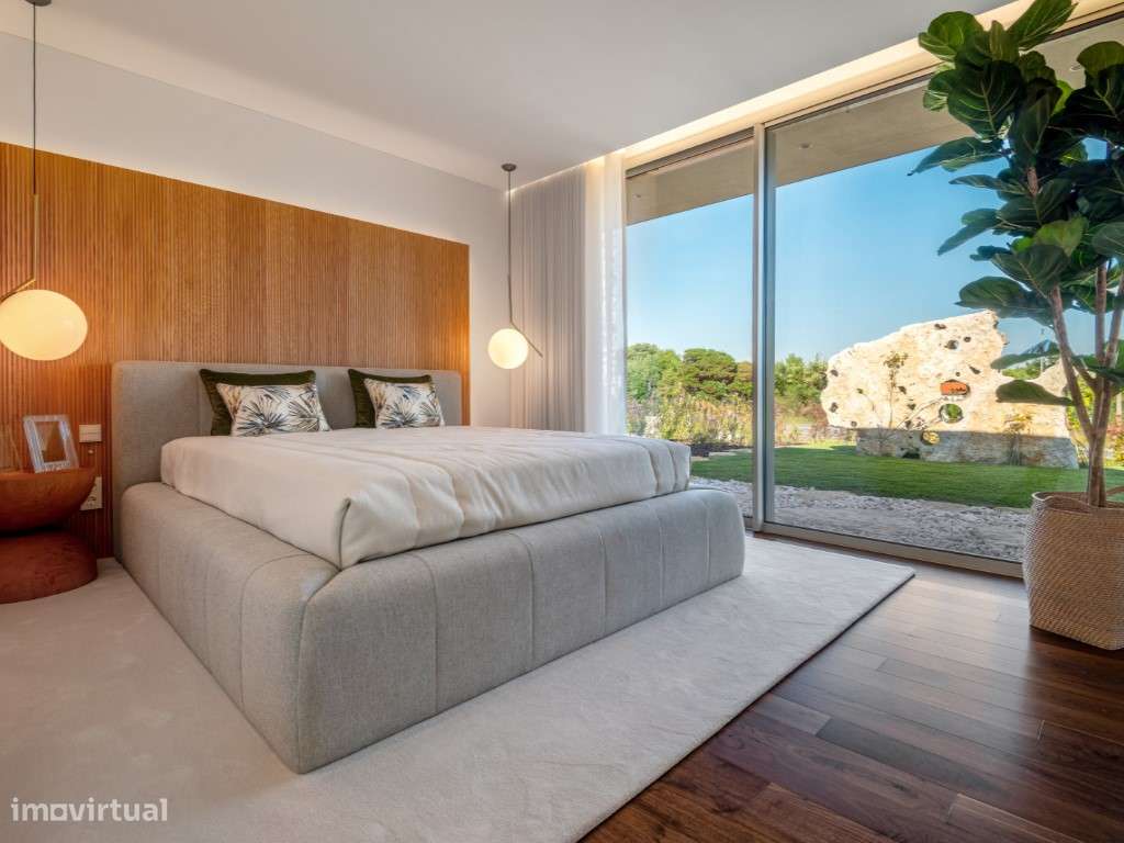 Moradia de extraordinária qualidade junto à lagoa, golfe e praia-22