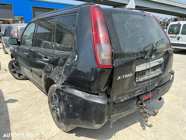 Dezmembram / Dezmembrari / Piese / Accesorii Nissan x-trail 2006 negru 2.2 dci YD22ETI volan stanga - 2