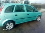 Dezmembrez Opel Meriva 1.7 - 4