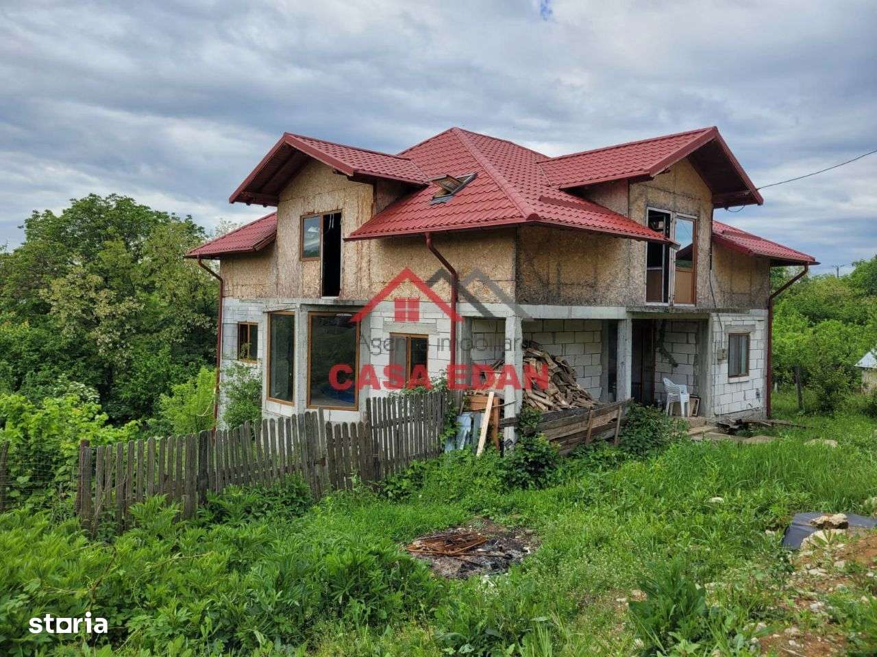 Casa 2010 in Scorteni 7 camere teren 1222mp 62.000e - Imagine principală: 2/20