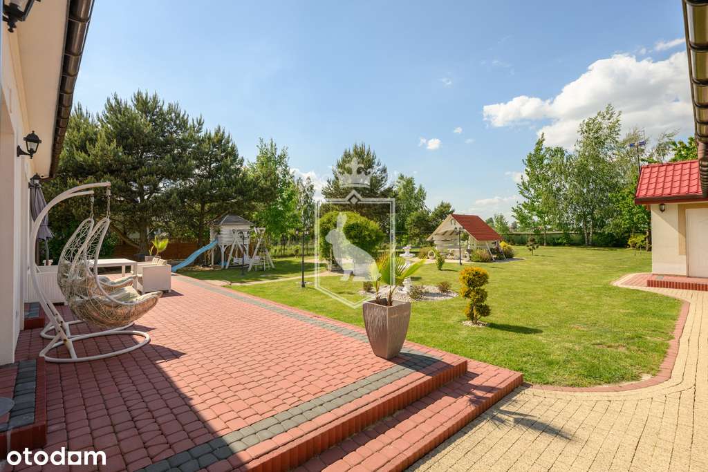 Piękny dom parterowy na imponującej działce 2130m2-13