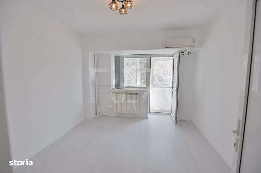 Apartament cu 2 camere la un minut de mers pe jos pana la statia autob - Imagine principală: 2/6