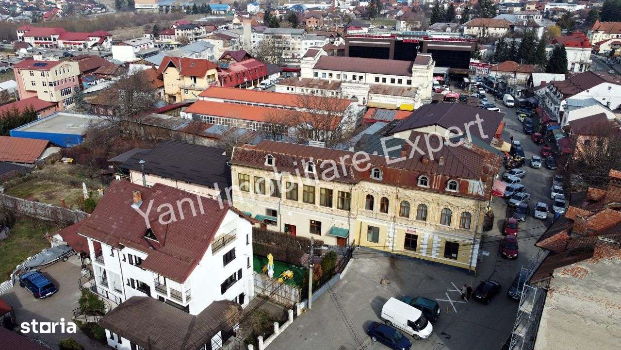 Pensiune de vânzare în Curtea de Argeș, piața centrală. - Imagine principală: 2/20