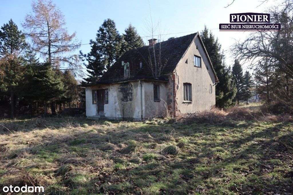 Działka zabudowana domem do kapitalnego remontu-4