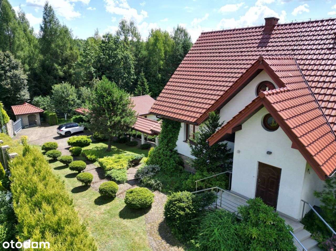 Siedliskowa rezydencja z dużym, pięknym ogrodem-19