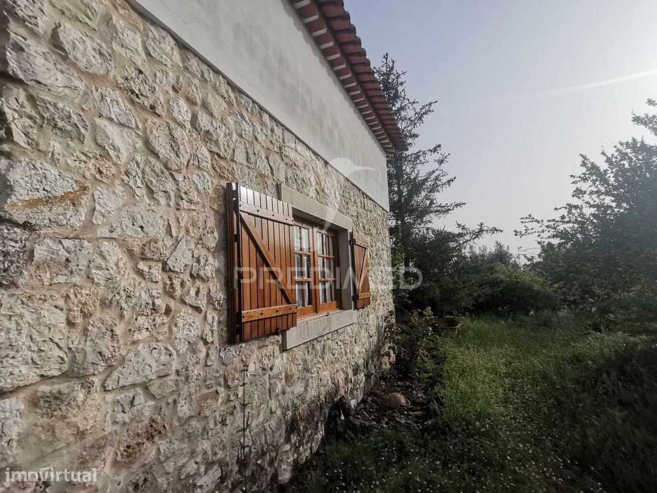 Encantadora moradia renovada em pedra e madeira. - Grande imagem: 5/29