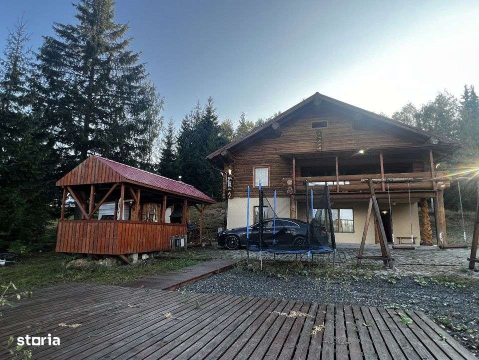 Cabana din Busteni, 320 mp utili, 1500 mp de teren, zona Belis - Imagine principală: 2/19