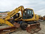 Komatsu PW 130 Es, dezmembrez - 2