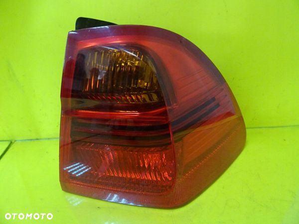 LAMPA PRAWY TYŁ BMW E91/320d KOMBI 2.0D 102KW 04- - 1