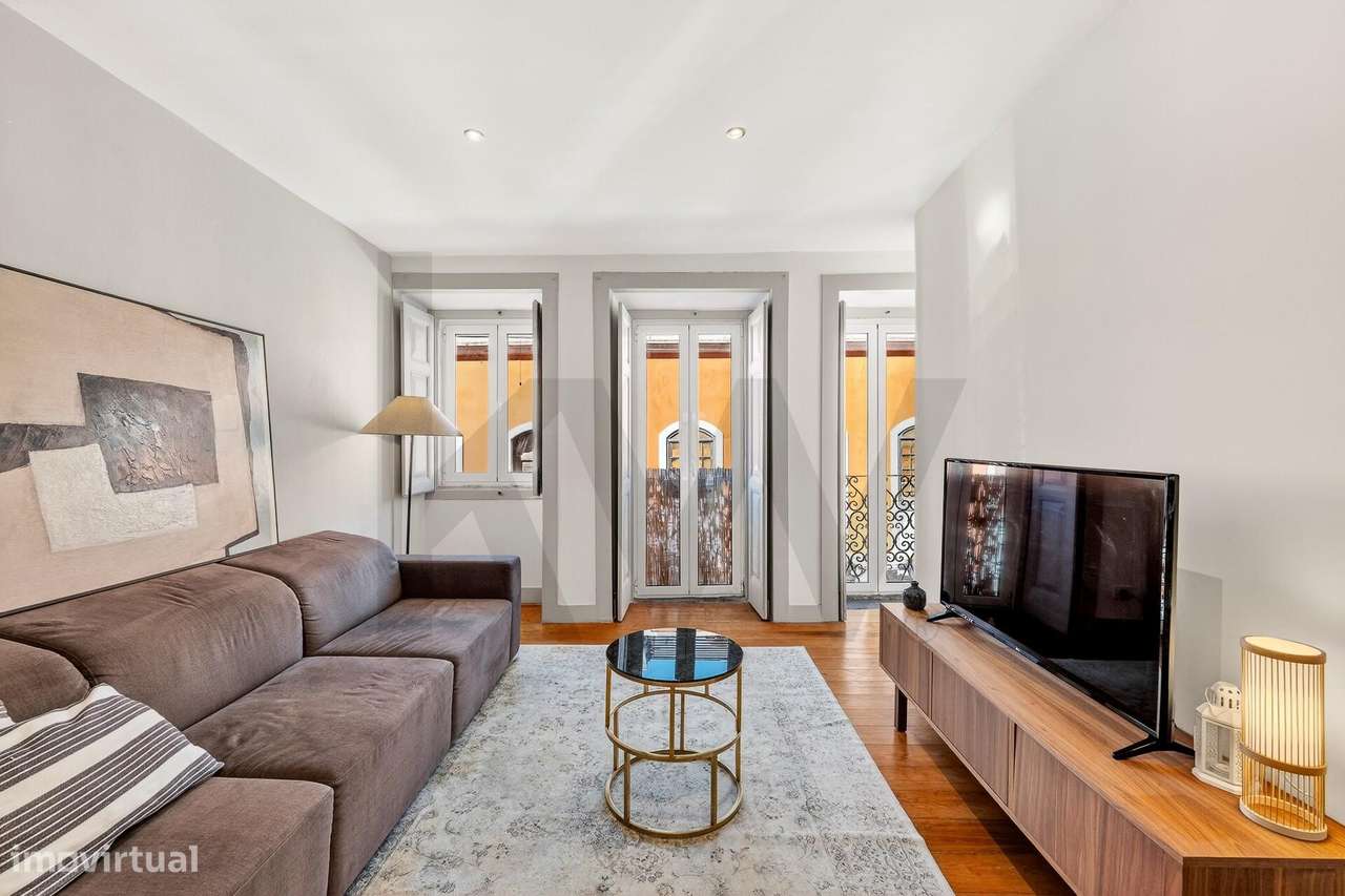 Espaçoso T1 remodelado com terraço exclusivo, em prédio histórico | Al - Grande imagem: 2/27