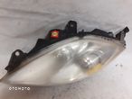 .  PRZOD PRZEDNIA LAMPA  LEWA FIAT BRAVO II - 2