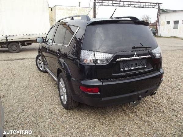 Dezmembrez Mitsubishi Outlander Facelift 2011 2.3DID volan stanga - 1