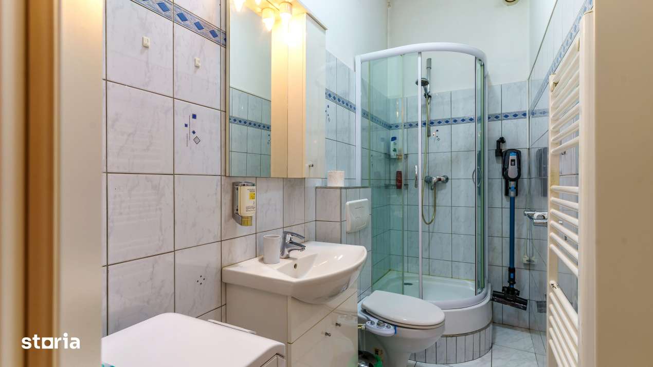 Apartament in centrul orasului,zona SORA,cladire monument–un fragmen-10