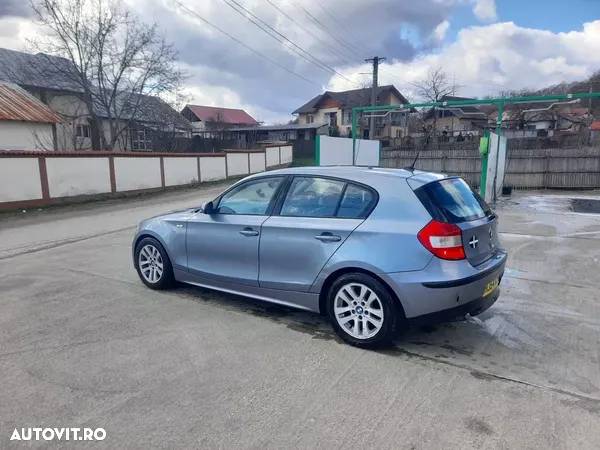 Dezmembrez BMW seria 1 E87 NFL / FL / LCI / M Pachet motor calculator cutie viteze usa aripa capota haion trager bara faruri xenon stop interior jante navigatie oglinzi plafon praguri volan etc - 9