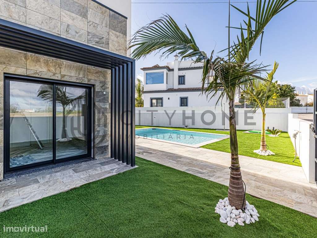 Moradia T2+1 com rooftop, piscina e vista mar - Grande imagem: 4/21