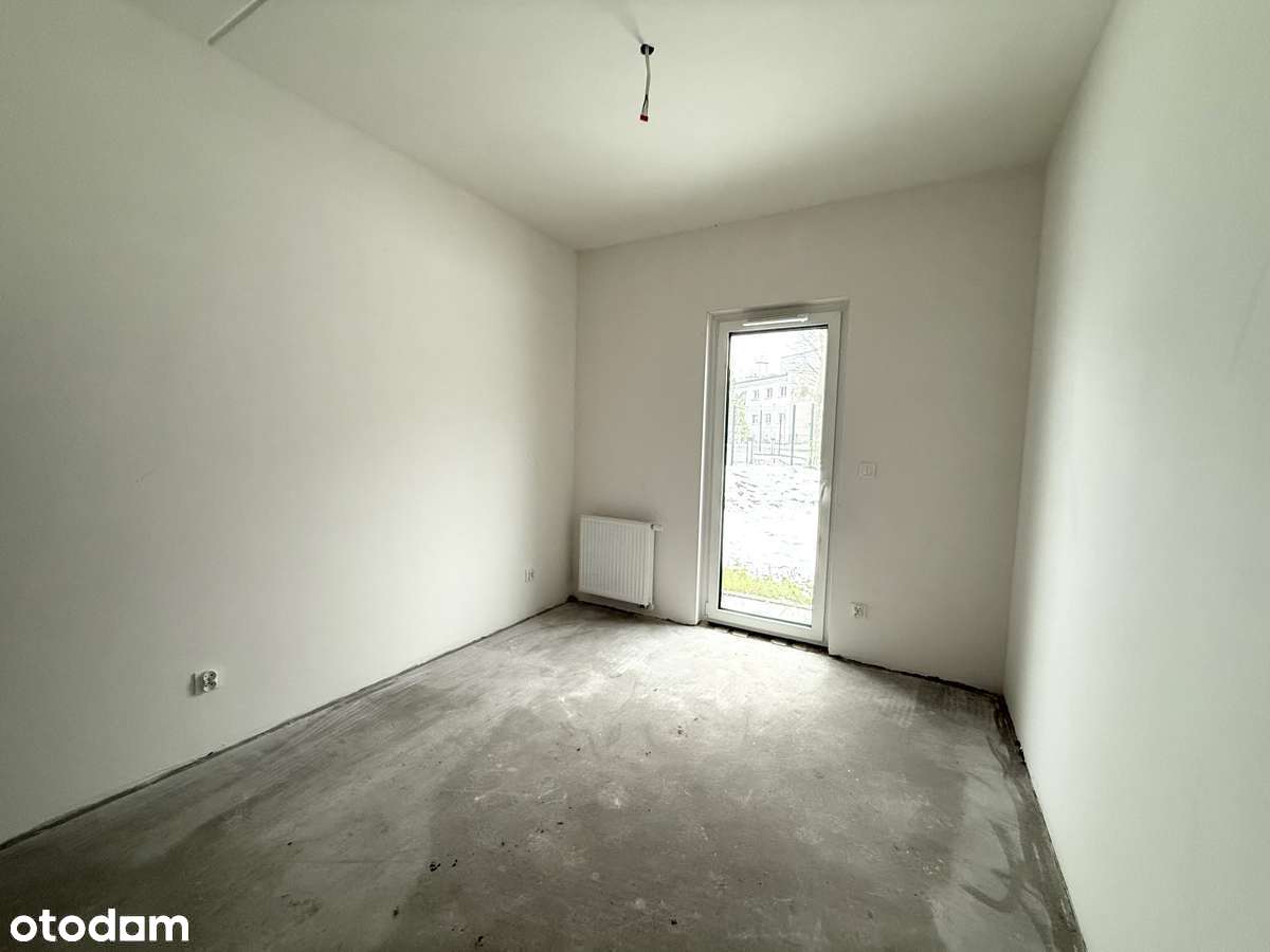 Parterowe mieszkanie 2pokojowe z ogródkiem i miejscem w hali garażowej-5