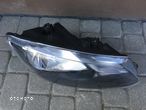 VW TOURAN II REFLEKTOR PRAWY LAMPA PRAWA PRZÓD 10-15 - 2