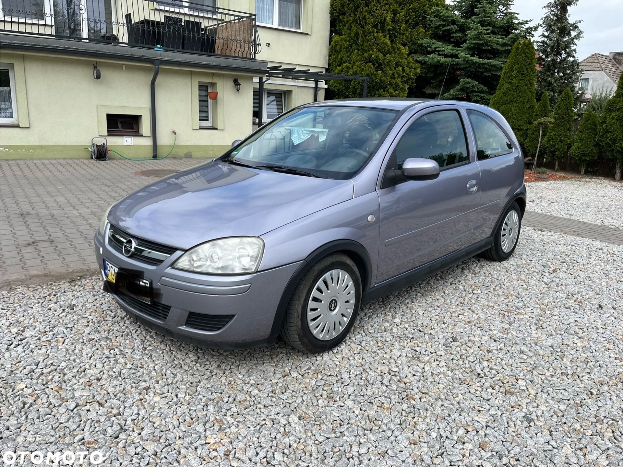 Opel Corsa 1.0 12V Cosmo - 1