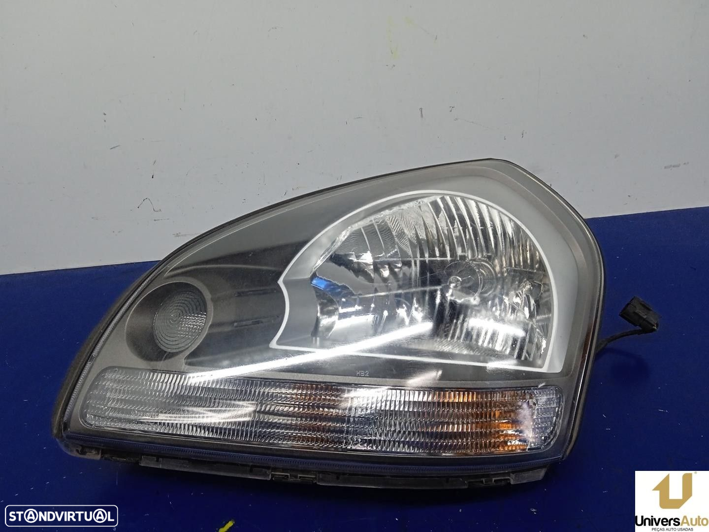 FAROL ESQUERDO HYUNDAI TUCSON 2006 -D4EA - 4