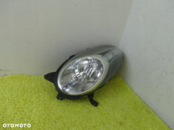 LAMPA PRZÓD LEWA NISSAN MICRA 3 III K12 LIFT 07-11 EURO CAŁA - 1