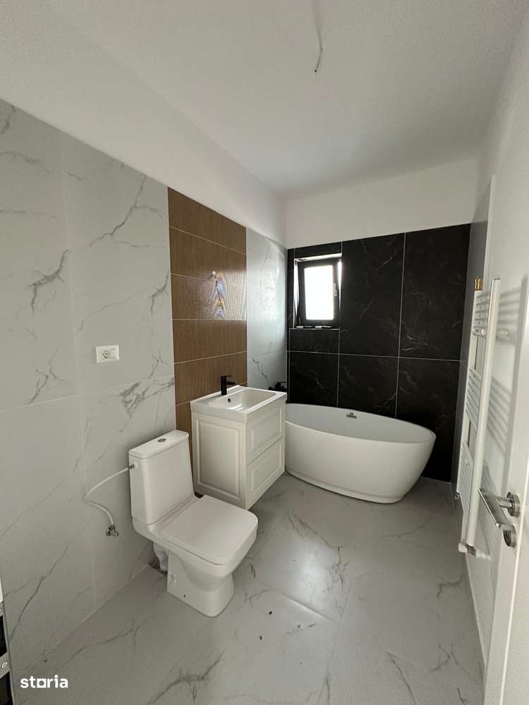 Casa cu teren 520 mp, incalzire in pardoseala si tripan in Domnesti-10