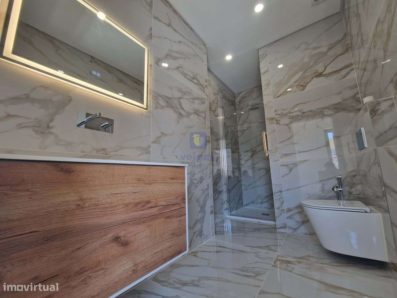 Apartamento T1 Novo no Centro de Caldas da Rainha com 2 lugares de est-10